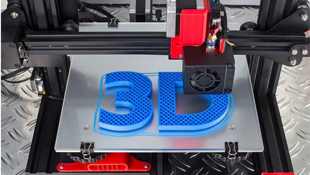A close-up image of a 3D printer in action, creating a intricate object layer by layer.